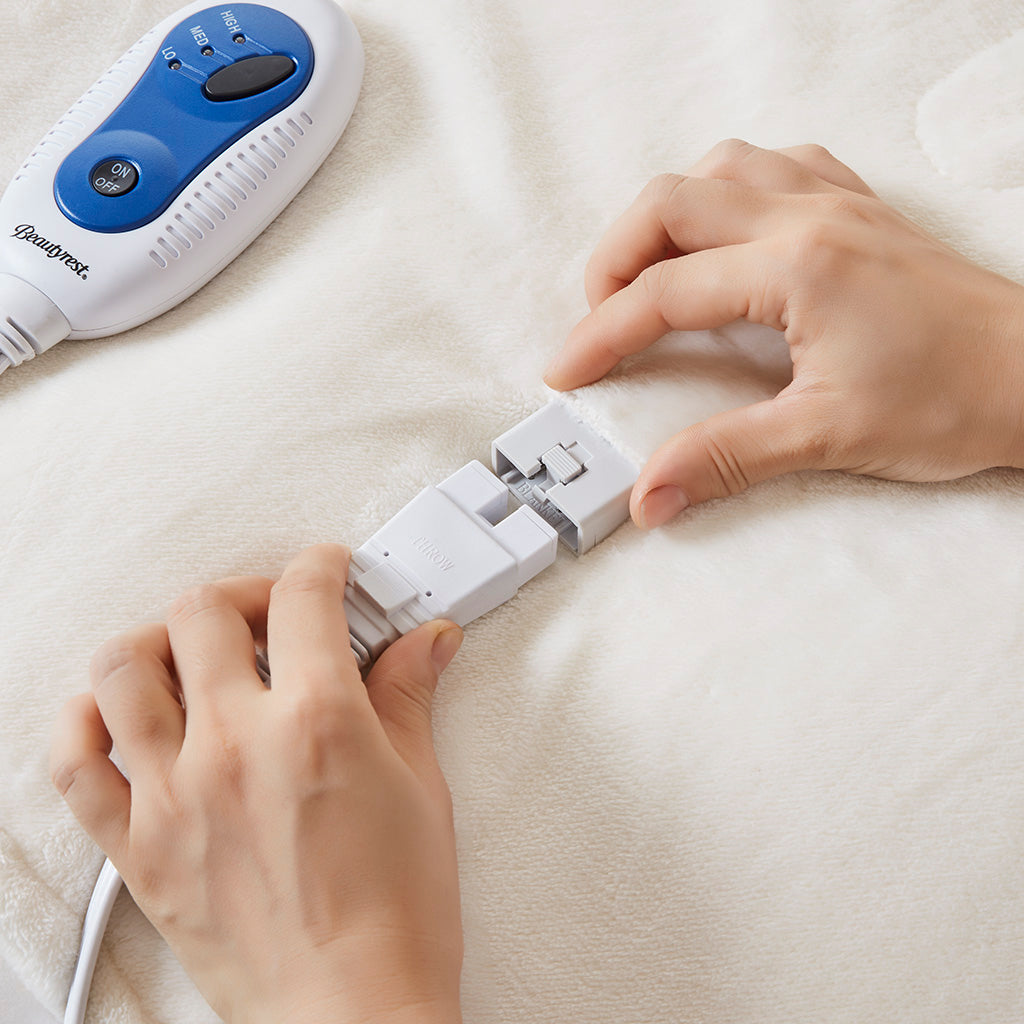 Soft electric heated throw controller close-up